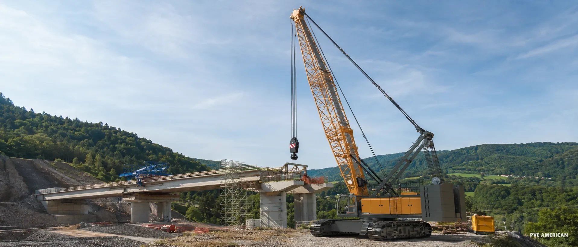PVE AMERICAN crawler crane lifting a bridge section